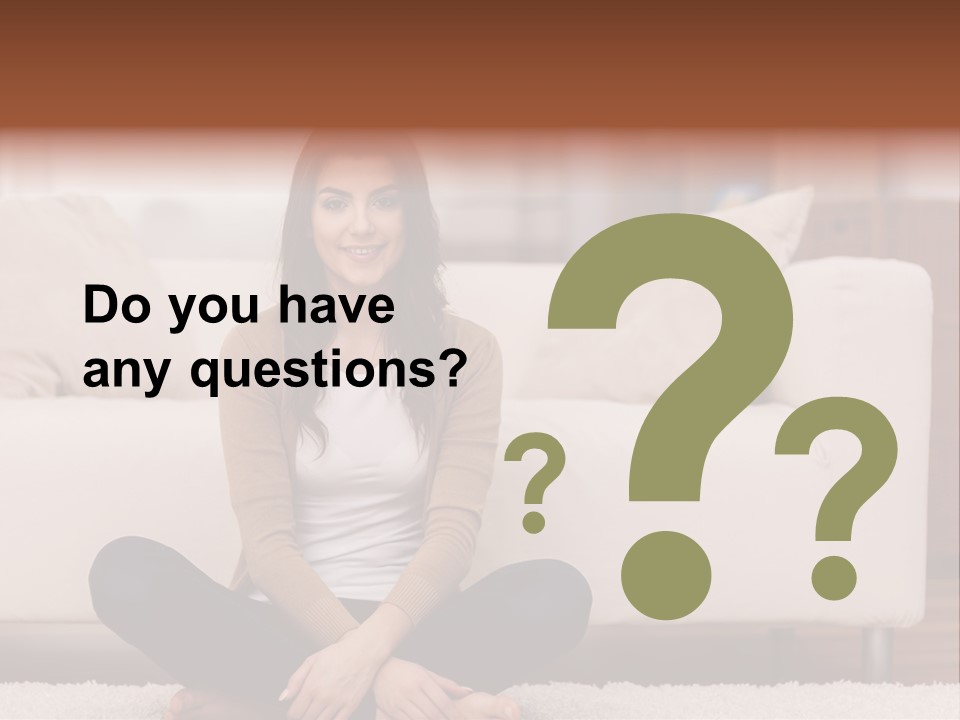A Woman Sitting On The Floor In Front Of A Couch PowerPoint Template