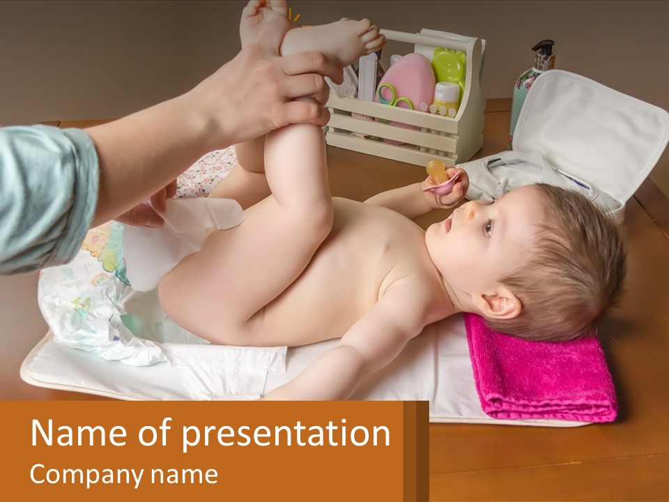 A Baby Laying On Its Back On A Blanket PowerPoint Template