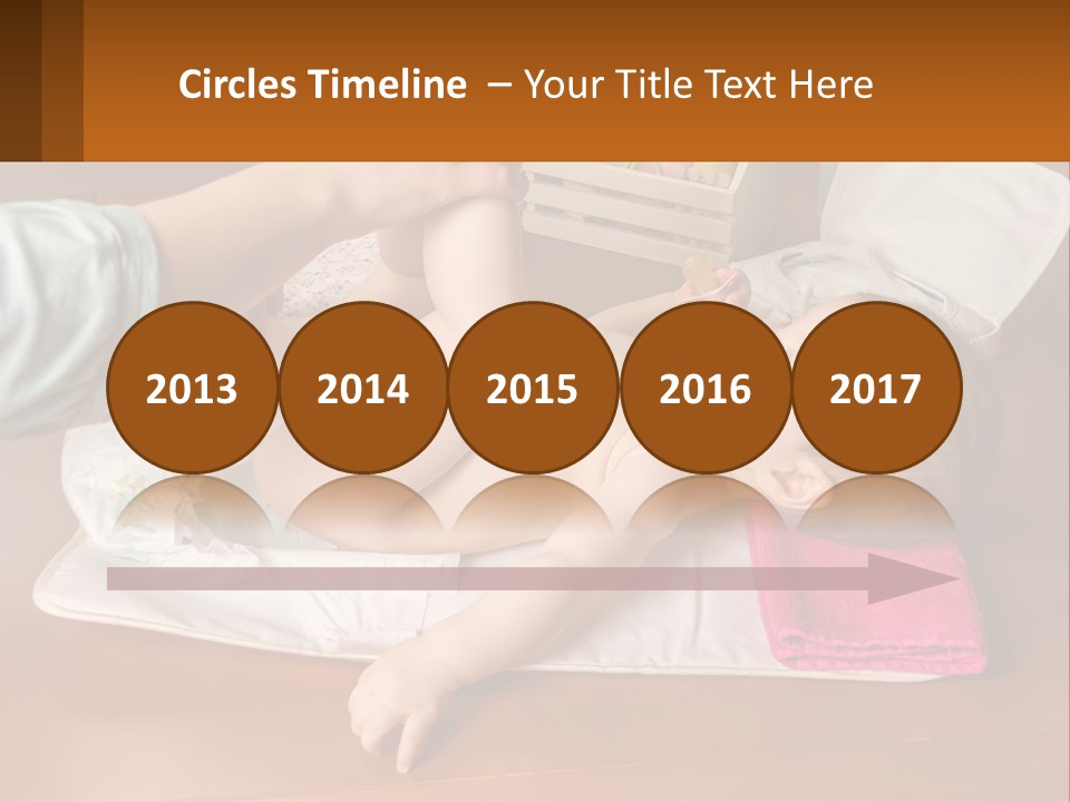 A Baby Laying On Its Back On A Blanket PowerPoint Template