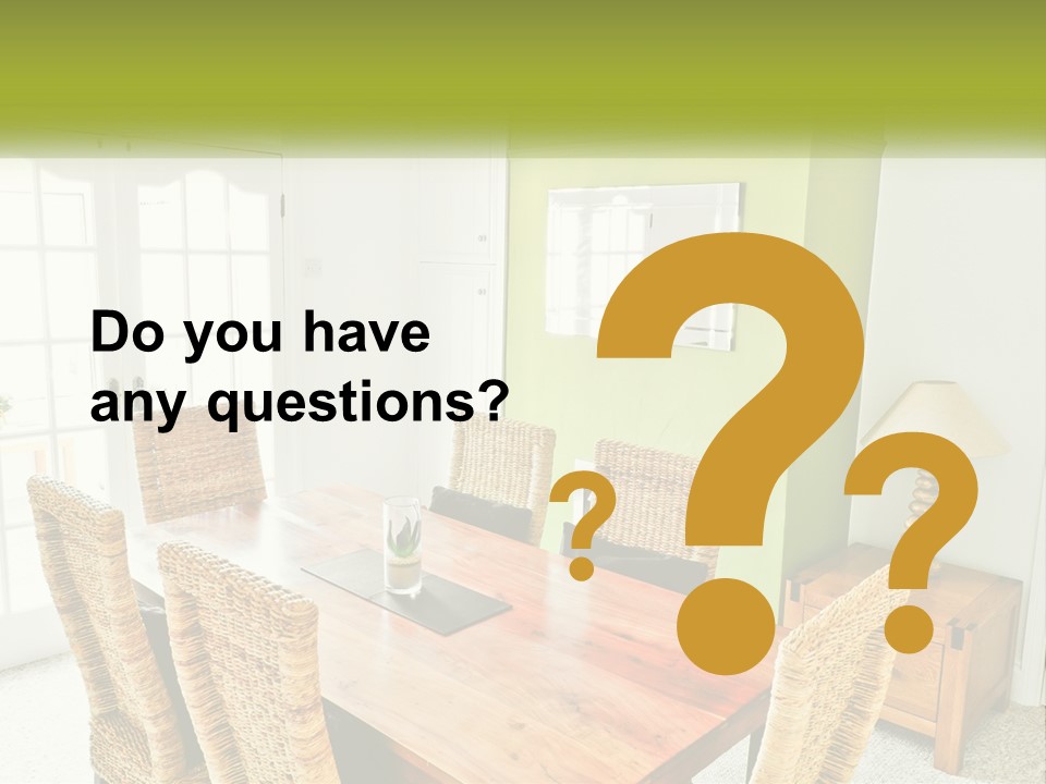 A Table With Chairs And A Lamp In A Room PowerPoint Template