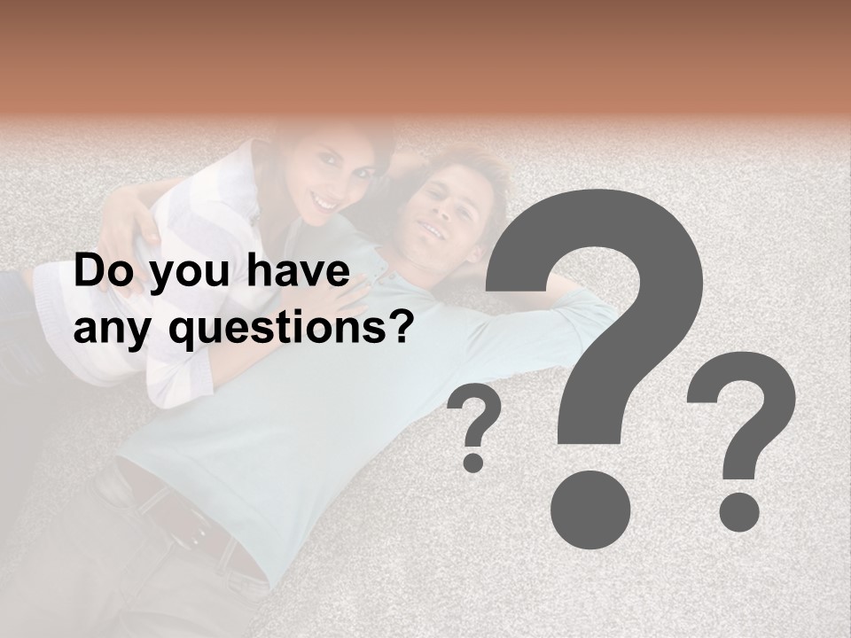 A Man And A Woman Laying On The Floor With Their Arms Around Each Other PowerPoint Template