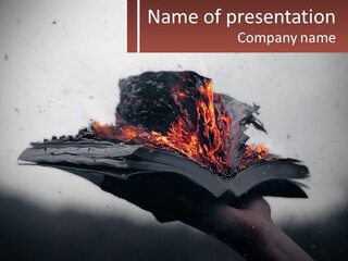 A Hand Holding An Open Book With A Fire In It PowerPoint Template
