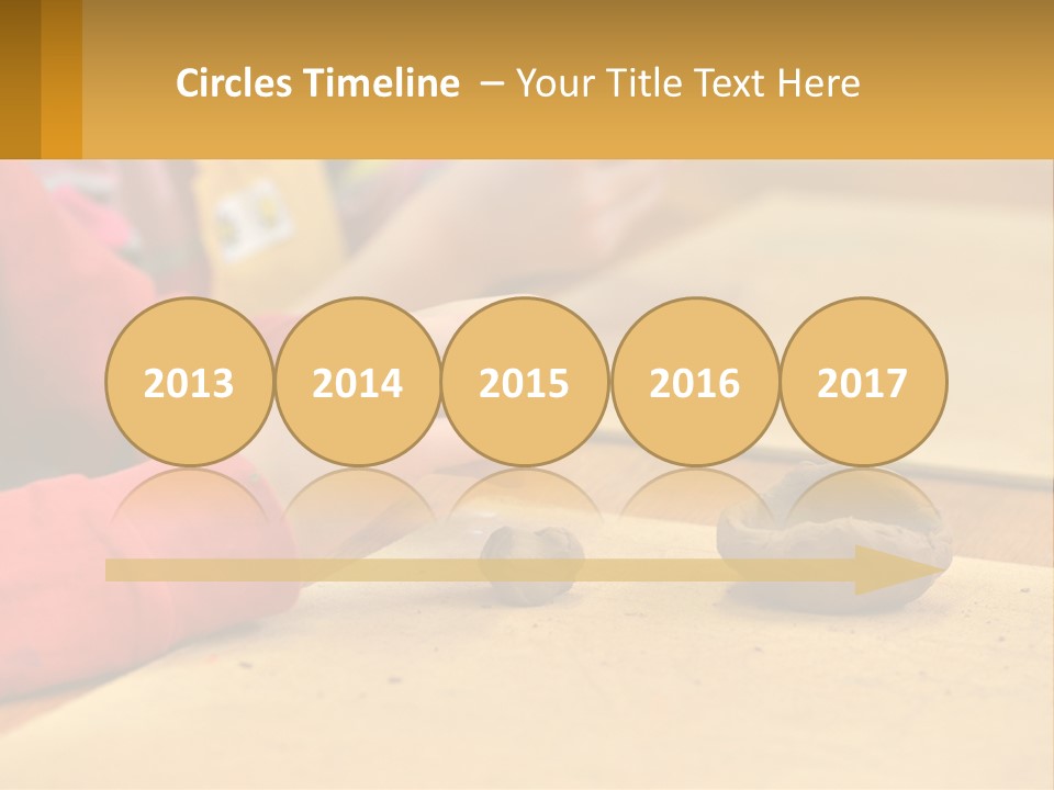 A Child Is Playing With A Cookie On A Table PowerPoint Template