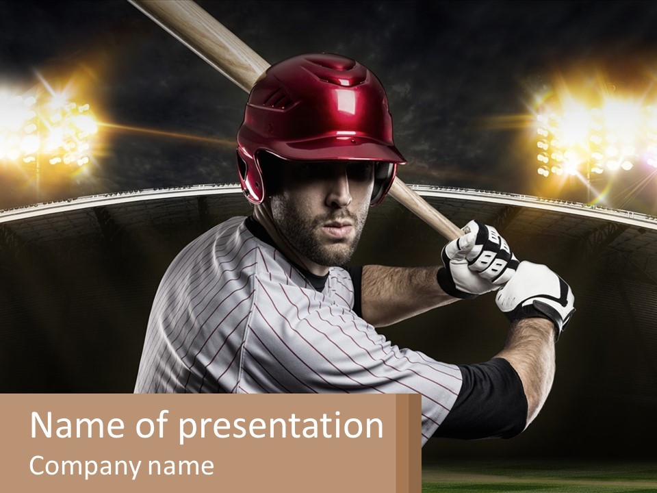 A Baseball Player Holding A Bat In A Stadium PowerPoint Template