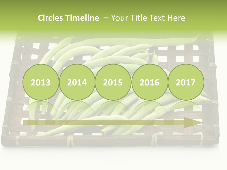 A Wooden Crate Filled With Green Beans On Top Of A Table PowerPoint Template