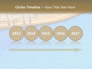 A Blue Swimming Pool With A Metal Hand Rail PowerPoint Template