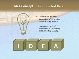 A Blue Swimming Pool With A Metal Hand Rail PowerPoint Template