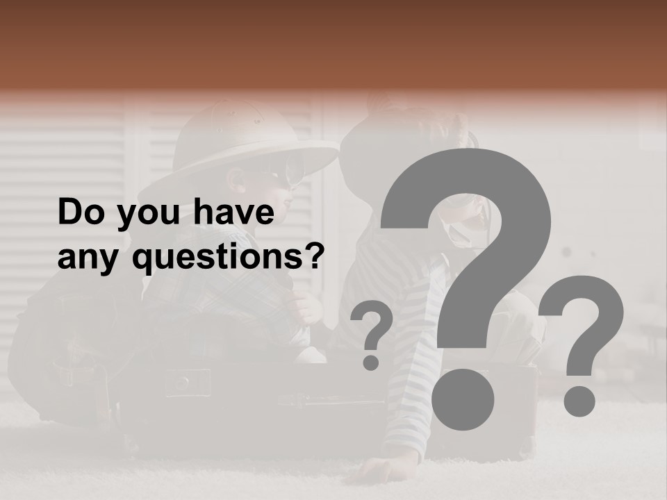 Two Children In Hats Sitting On A Suitcase PowerPoint Template