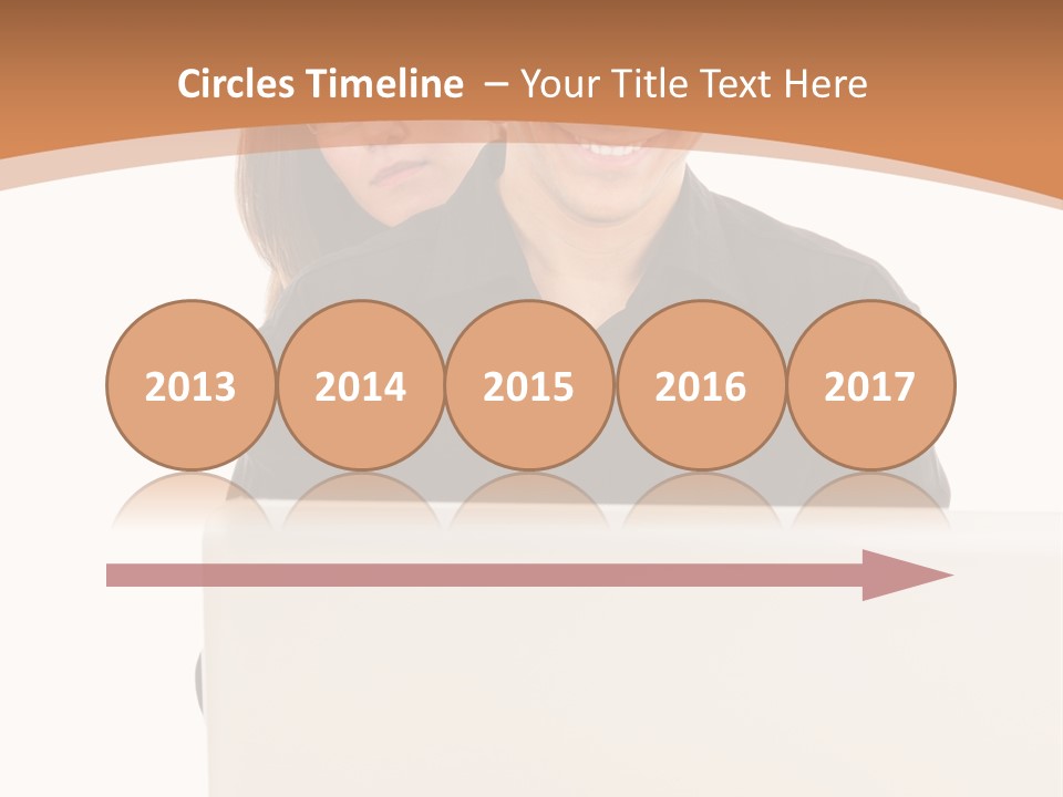 A Man And Woman Looking At A Laptop Computer PowerPoint Template