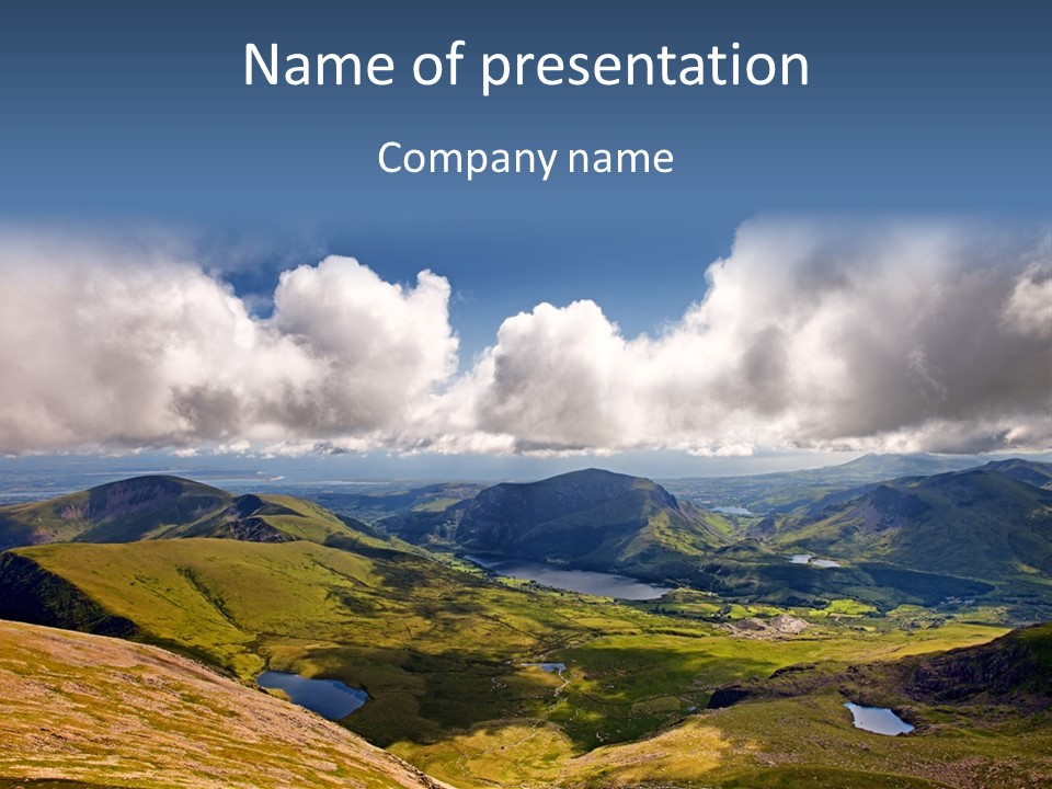 A Scenic View Of A Mountain Range With Clouds In The Sky PowerPoint Template