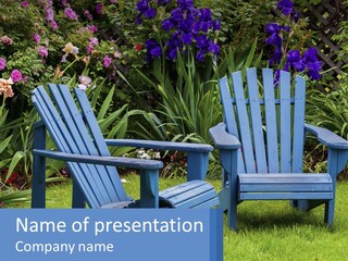 A Couple Of Blue Chairs Sitting In The Grass PowerPoint Template