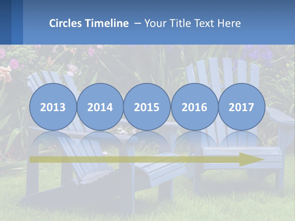 A Couple Of Blue Chairs Sitting In The Grass PowerPoint Template