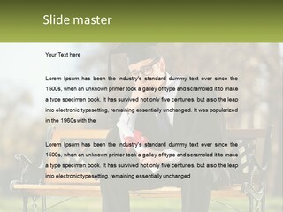 A Man In A Graduation Gown Sitting On A Bench PowerPoint Template
