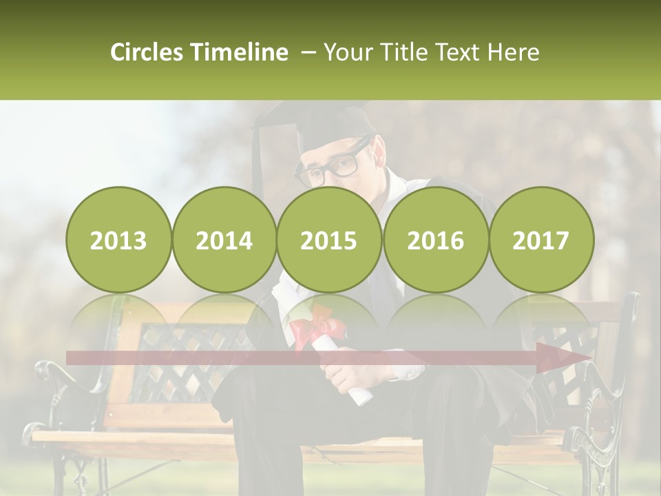 A Man In A Graduation Gown Sitting On A Bench PowerPoint Template