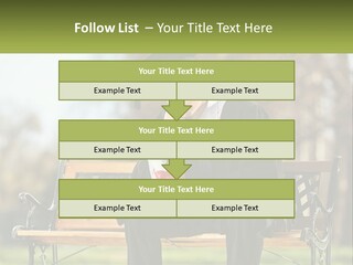 A Man In A Graduation Gown Sitting On A Bench PowerPoint Template