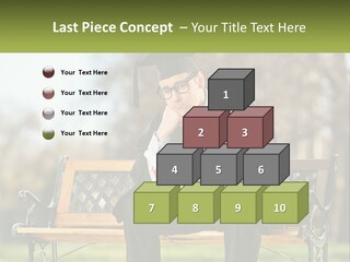 A Man In A Graduation Gown Sitting On A Bench PowerPoint Template