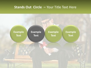 A Man In A Graduation Gown Sitting On A Bench PowerPoint Template