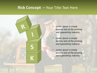 A Man In A Graduation Gown Sitting On A Bench PowerPoint Template