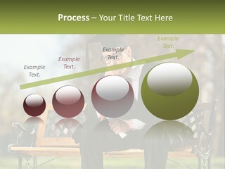 A Man In A Graduation Gown Sitting On A Bench PowerPoint Template