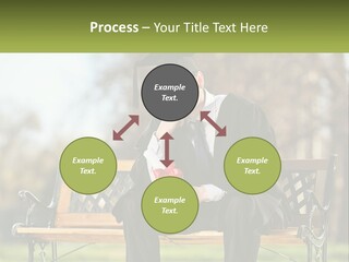 A Man In A Graduation Gown Sitting On A Bench PowerPoint Template