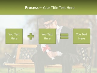 A Man In A Graduation Gown Sitting On A Bench PowerPoint Template