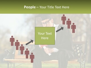 A Man In A Graduation Gown Sitting On A Bench PowerPoint Template