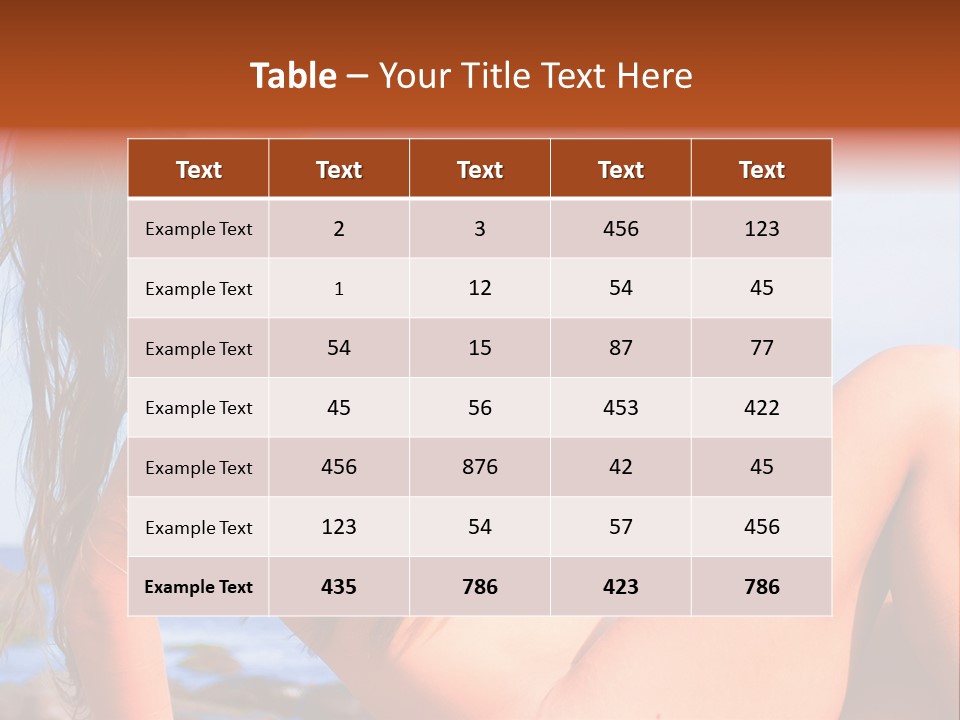 A Woman Is Sitting On The Beach With Her Hair Blowing In The Wind PowerPoint Template