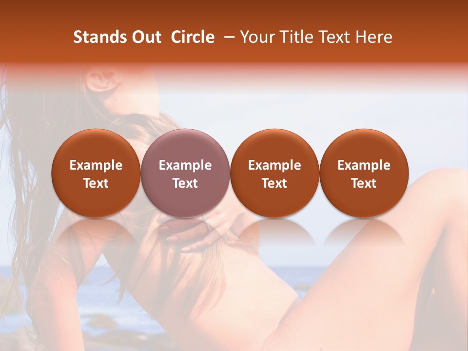 A Woman Is Sitting On The Beach With Her Hair Blowing In The Wind PowerPoint Template