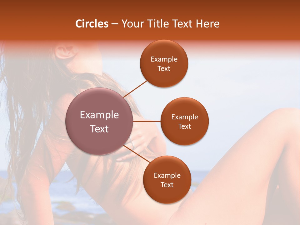 A Woman Is Sitting On The Beach With Her Hair Blowing In The Wind PowerPoint Template