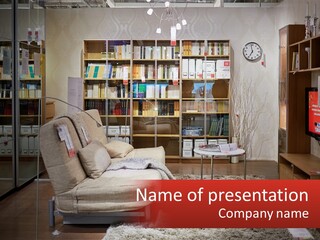 A Living Room With A Couch And Bookshelf PowerPoint Template