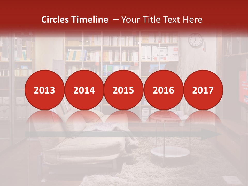 A Living Room With A Couch And Bookshelf PowerPoint Template