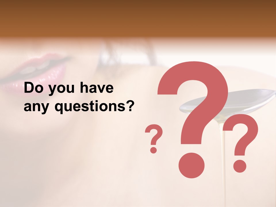 A Woman Is Holding A Spoon With Oil On It PowerPoint Template