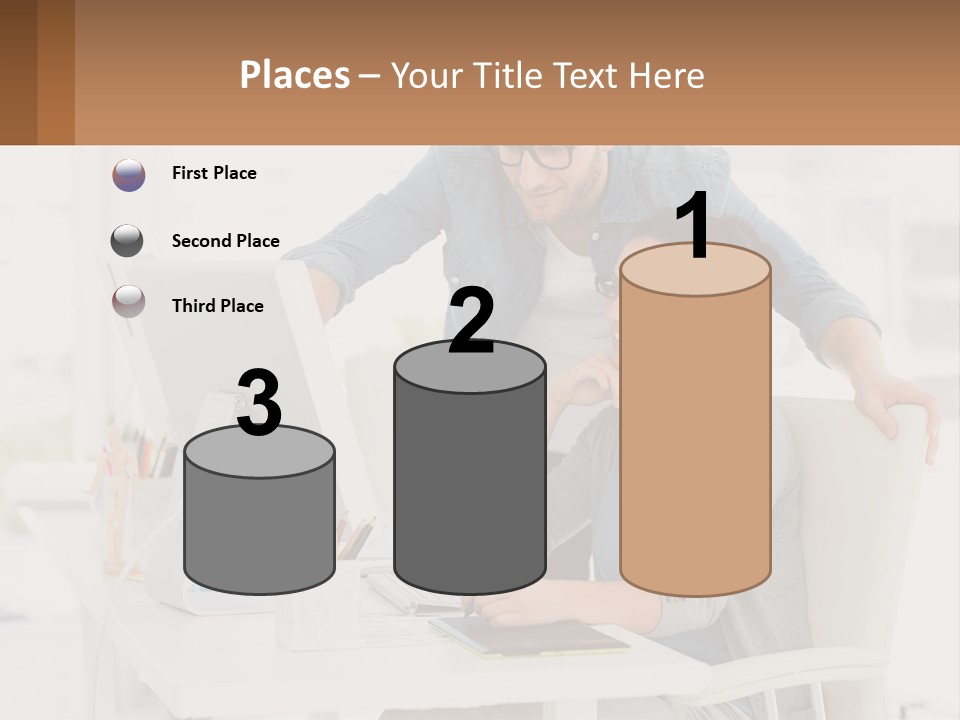 A Man And A Woman Sitting At A Desk Looking At A Computer Screen PowerPoint Template