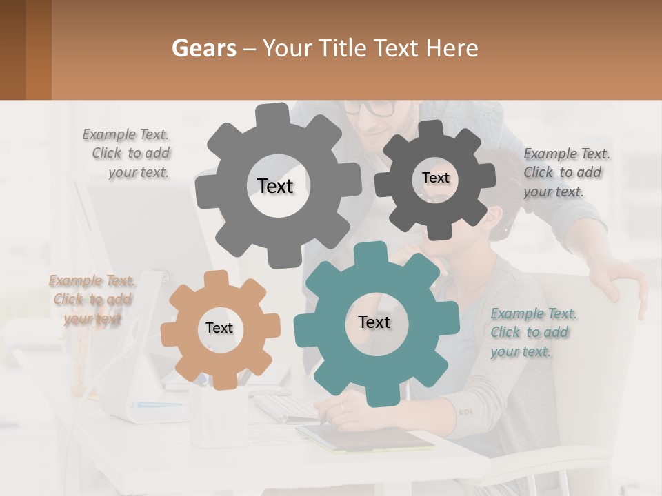 A Man And A Woman Sitting At A Desk Looking At A Computer Screen PowerPoint Template