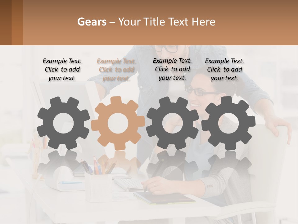 A Man And A Woman Sitting At A Desk Looking At A Computer Screen PowerPoint Template