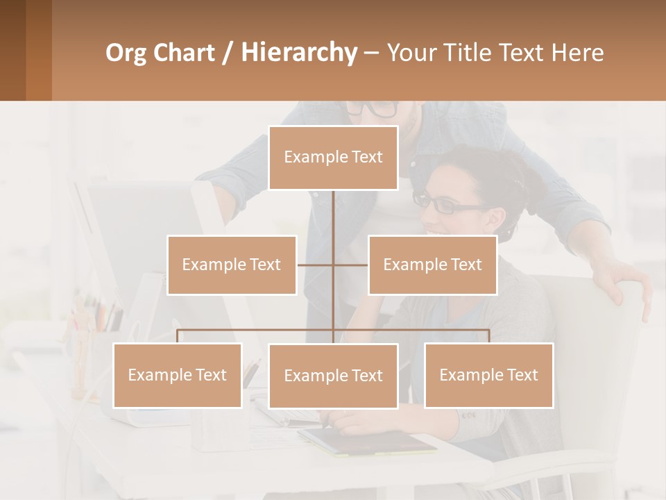 A Man And A Woman Sitting At A Desk Looking At A Computer Screen PowerPoint Template