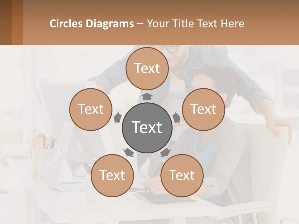 A Man And A Woman Sitting At A Desk Looking At A Computer Screen PowerPoint Template