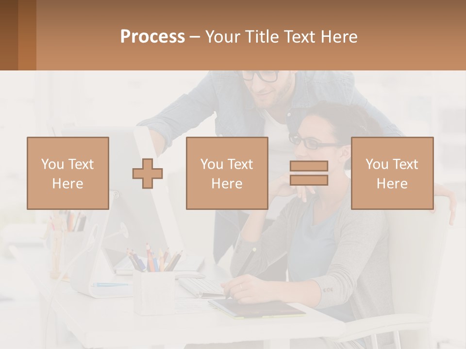 A Man And A Woman Sitting At A Desk Looking At A Computer Screen PowerPoint Template