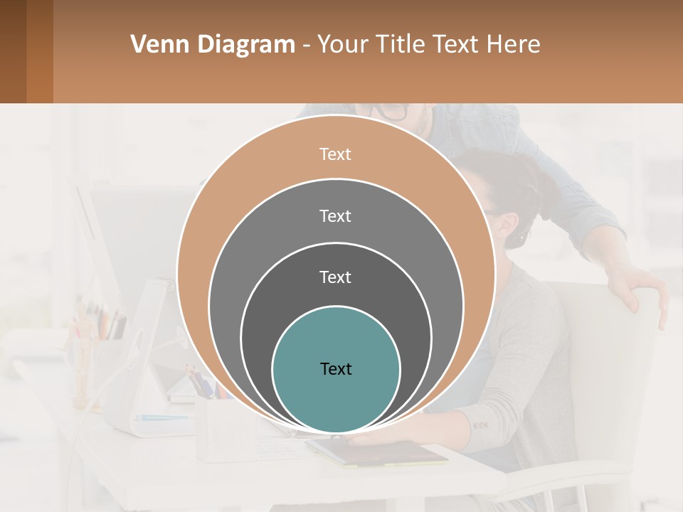 A Man And A Woman Sitting At A Desk Looking At A Computer Screen PowerPoint Template