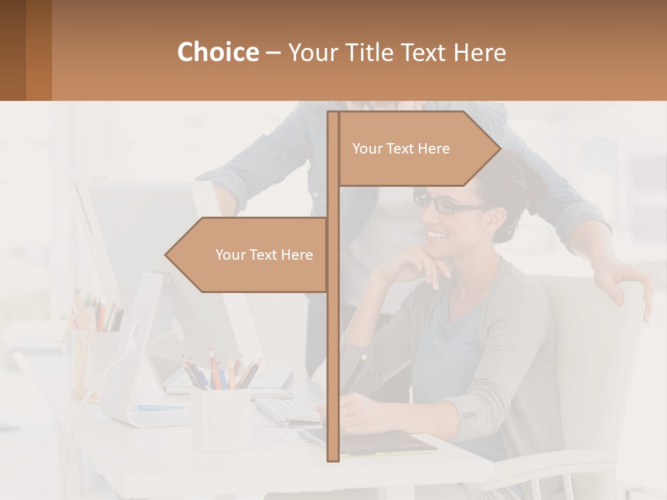 A Man And A Woman Sitting At A Desk Looking At A Computer Screen PowerPoint Template