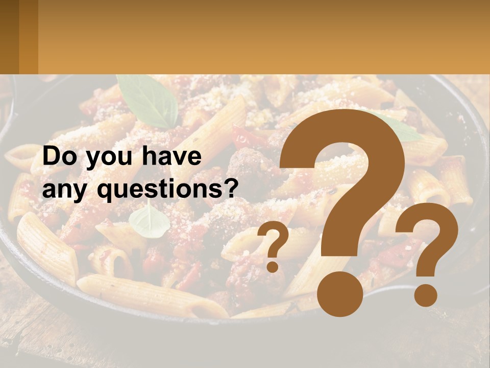 A Skillet Filled With Pasta And Meat On Top Of A Wooden Table PowerPoint Template