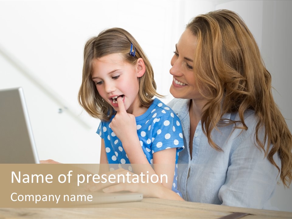 A Woman And A Little Girl Looking At A Laptop PowerPoint Template
