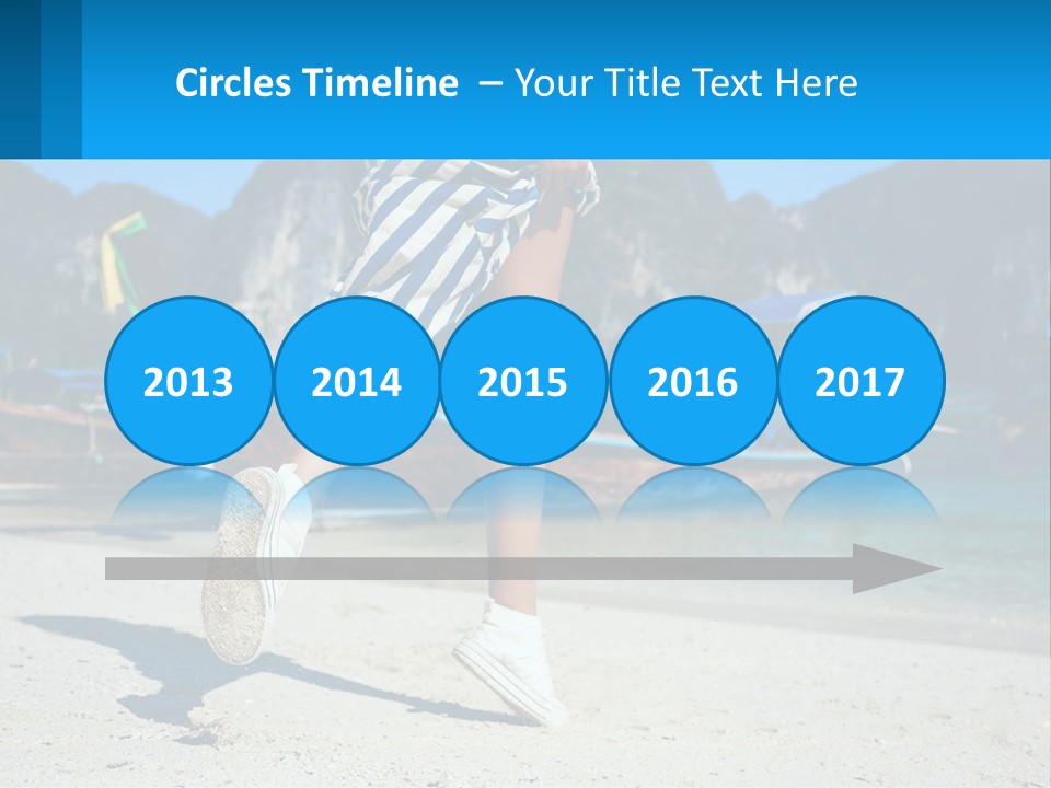 A Woman Walking On A Beach With Boats In The Background PowerPoint Template