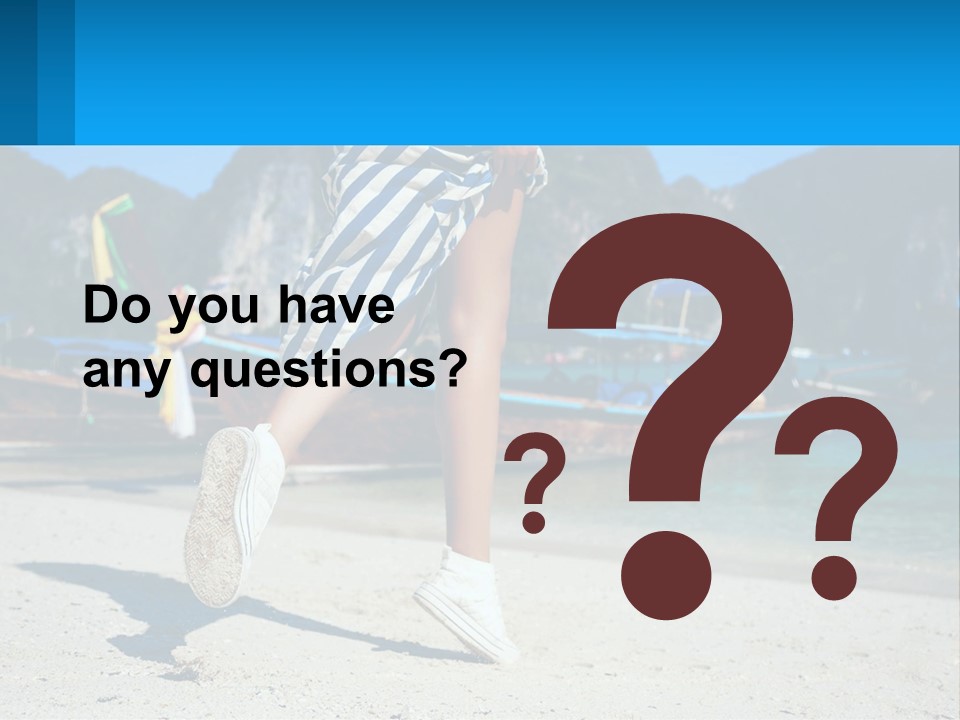 A Woman Walking On A Beach With Boats In The Background PowerPoint Template