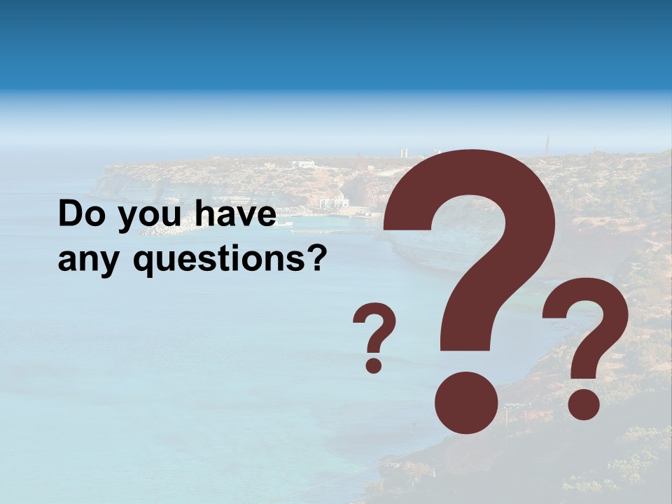 A Large Body Of Water Surrounded By Mountains PowerPoint Template