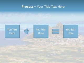 A Small Island In The Middle Of A Large Body Of Water PowerPoint Template
