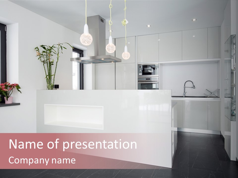 A Kitchen With A White Counter Top And White Cabinets PowerPoint Template