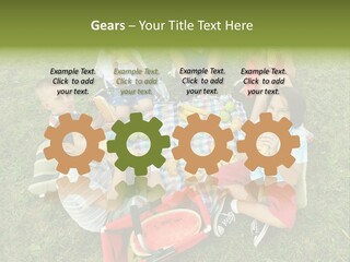 A Group Of Children Sitting On A Blanket Eating Food PowerPoint Template