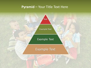 A Group Of Children Sitting On A Blanket Eating Food PowerPoint Template