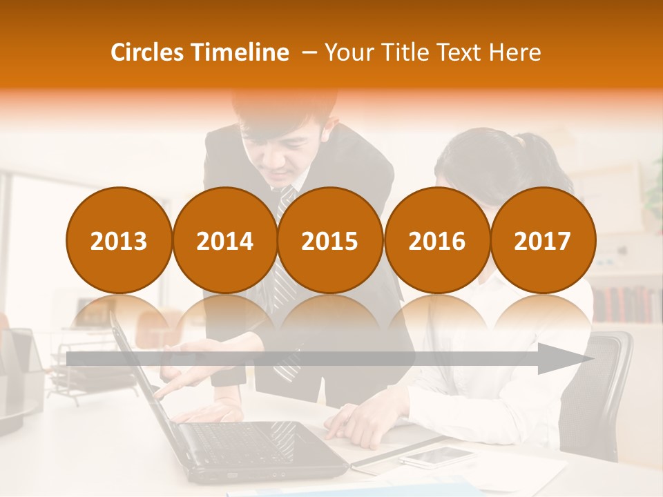 A Couple Of People That Are Looking At A Laptop PowerPoint Template